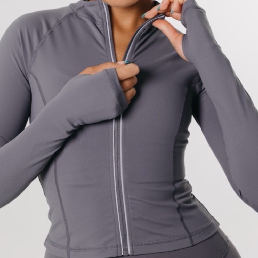 Skinluxe zip through running top tornada grey